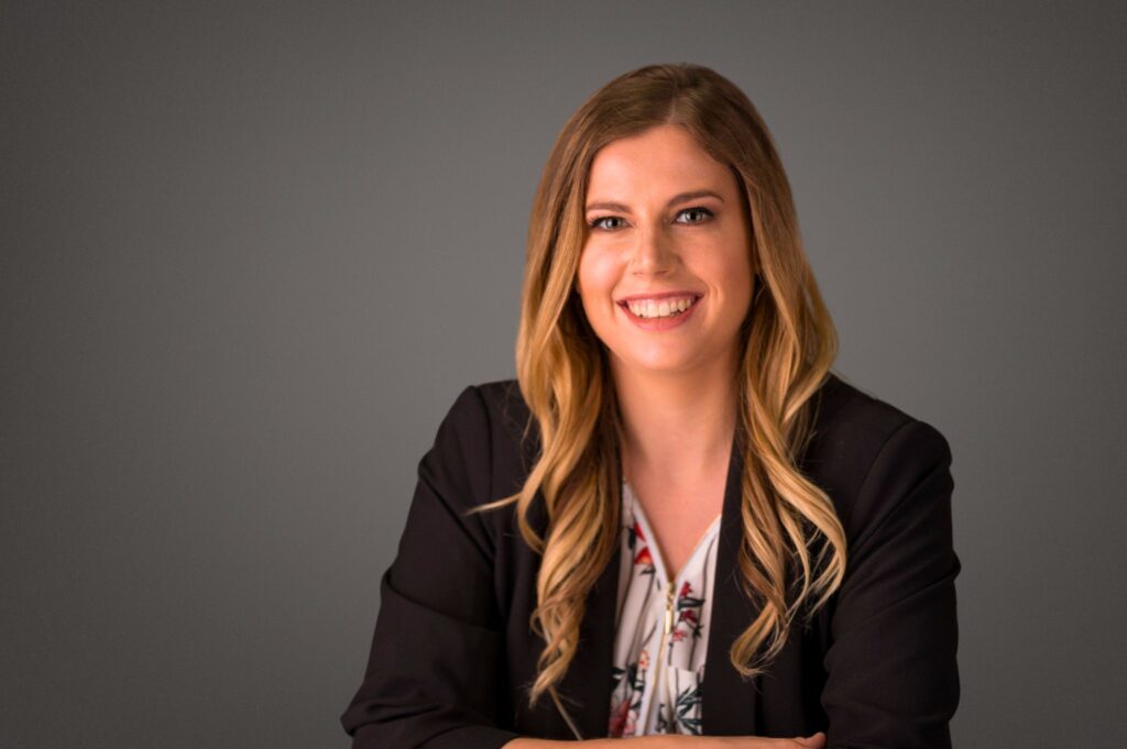 Sharayah Moroz, female therapist and counsellor at Oakville Wellness Center, smiling in professional headshot